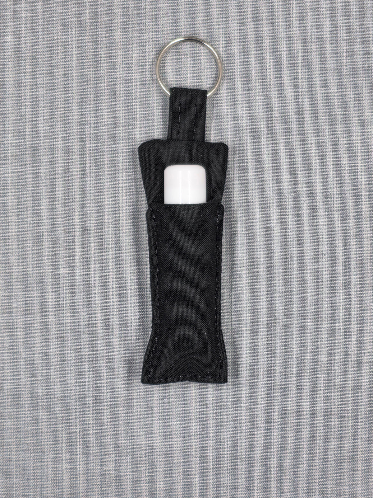 Black handmade lip balm holder keychain