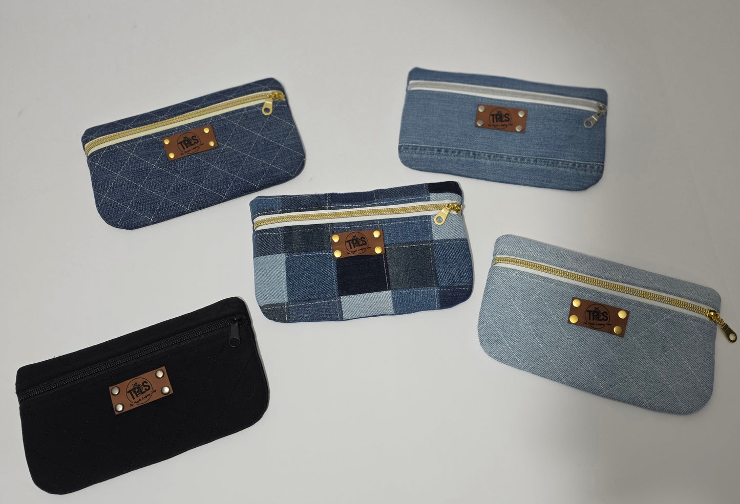 Slim denim belt bags in assorted repurposed denim styles