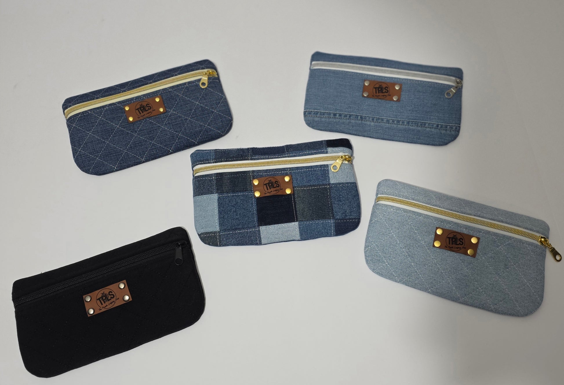 Slim denim belt bags in assorted repurposed denim styles